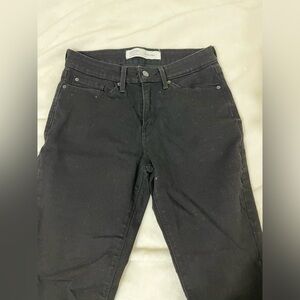 Mid rise skinny jeans.